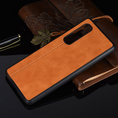 PU Leather Coated PC + TPU Hybrid Phone Protection Case for Oppo Find X2 Pro (Cerramic Back)